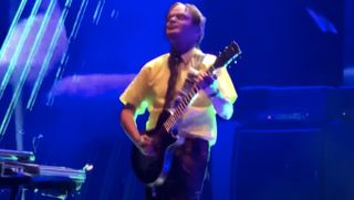 Adam Jones performs onstage with Tool in Milwaukee, Wisconsin on October 31, 2019