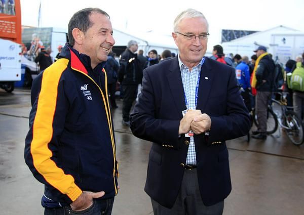 Claudio Corti, left, accompanied by UCI president Pat McQuaid at the U23 men's road race world championship.