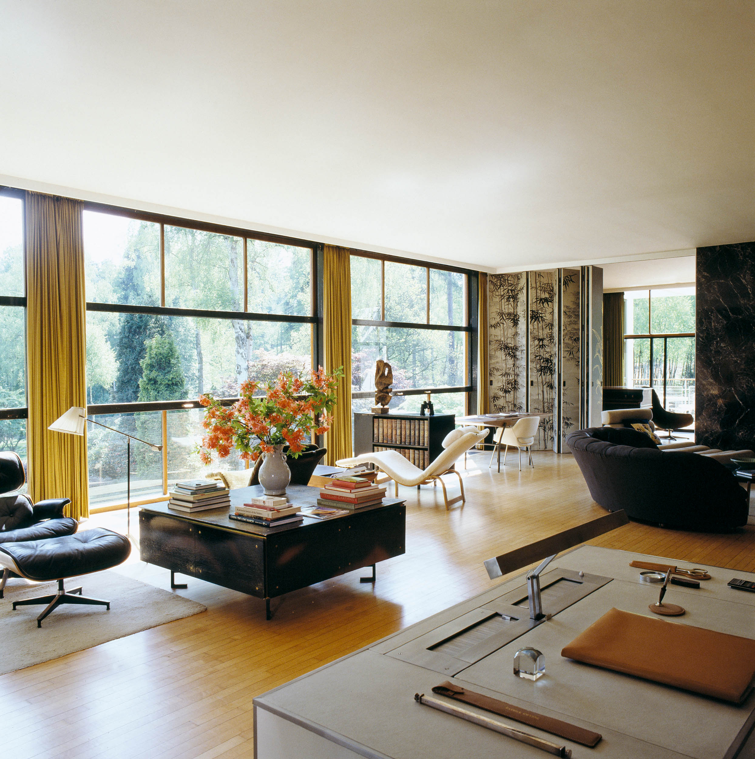 Modern living space in glass-walled room