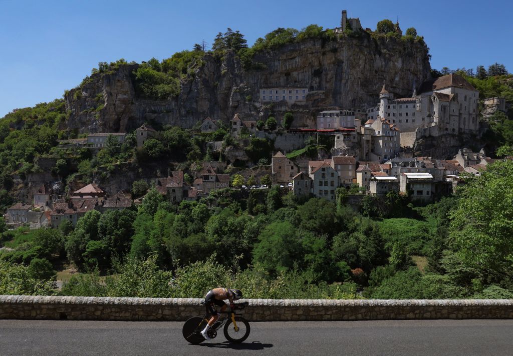 JumboVisma teams French rider Christophe Laporte cycles past the town of Rocamadour during the 20th stage of the 109th edition of the Tour de France cycling race 407 km individual time trial between LacapelleMarival and Rocamadour in southwestern France on July 23 2022 Photo by Thomas SAMSON AFP Photo by THOMAS SAMSONAFP via Getty Images