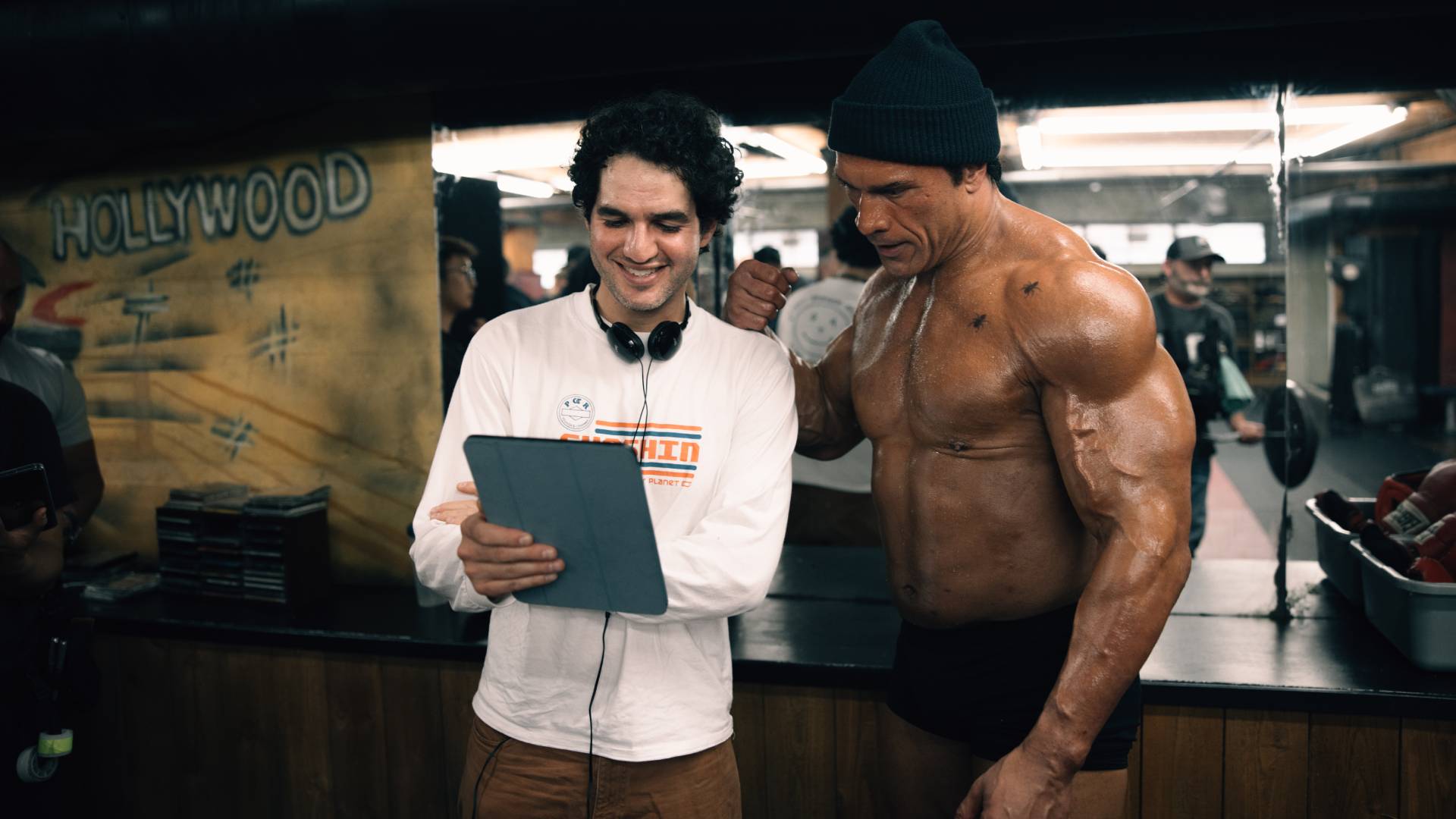 Benny Safdie directing Dwayne Johnson on the set of The Smashing Machine