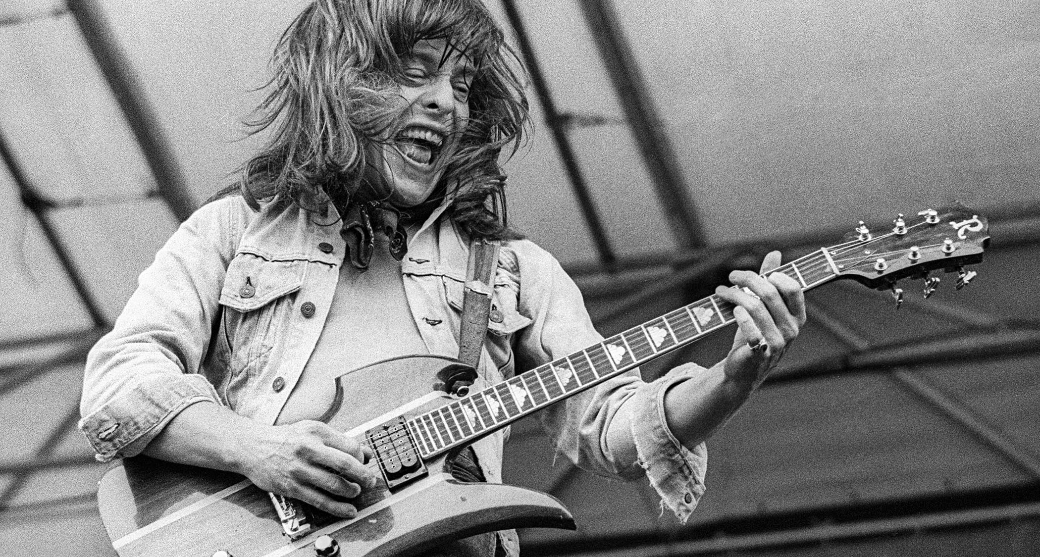 Rick Derringer is lost in the moment as he plays his B.C. Rich Mockingbird live onstage in 1977.