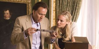 Nicolas Cage, Diane Kruger reading a clue National Treasure: Book of Secrets