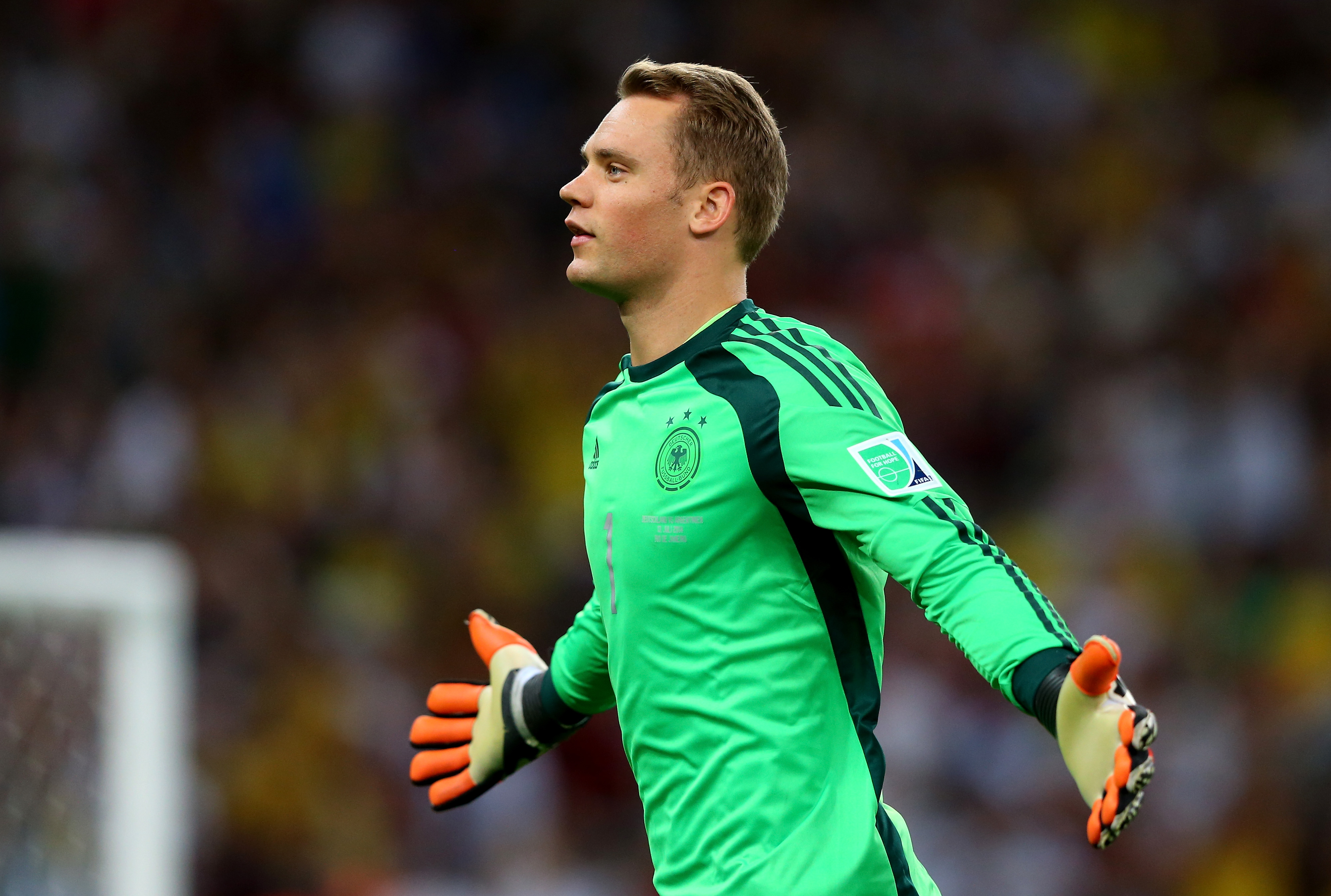 Manuel Neuer celebrates Germany's goal in the 2014 World Cup final against Argentina.