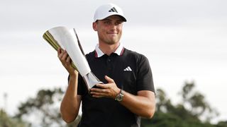 Ludvig Aberg with the Genesis Invitational trophy