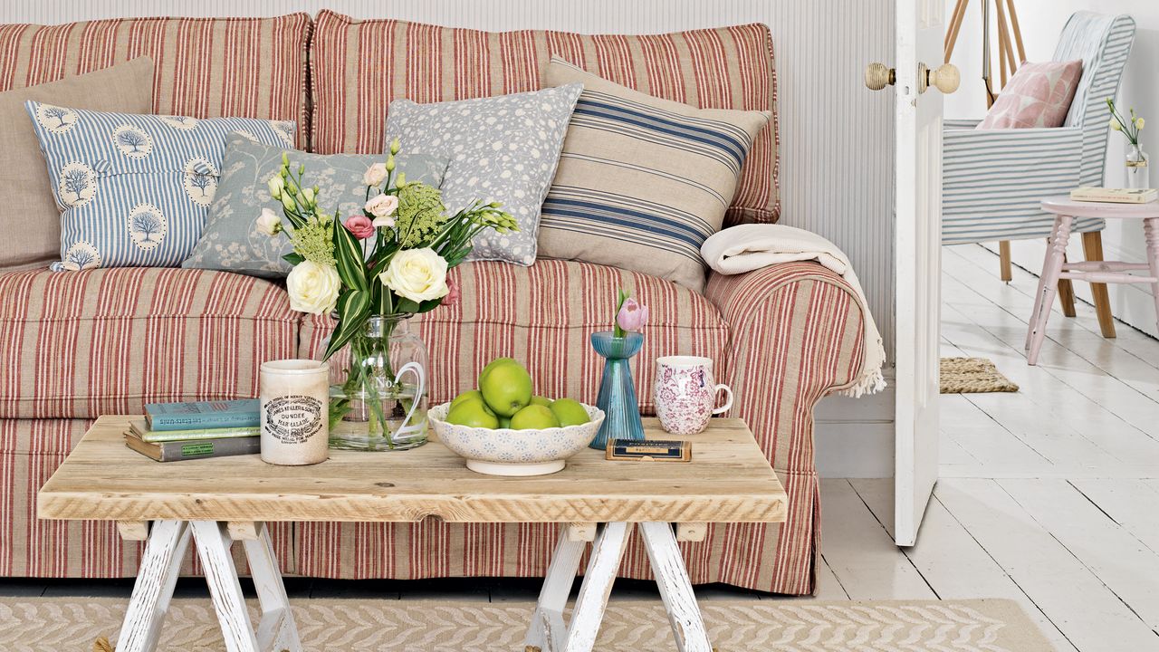 Patterned red sofa with wooden coffee table