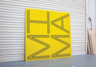 Black letters on yellow background