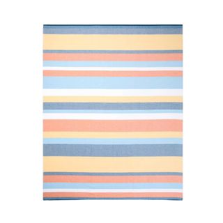 A yellow, orange, and blue striped beach towel