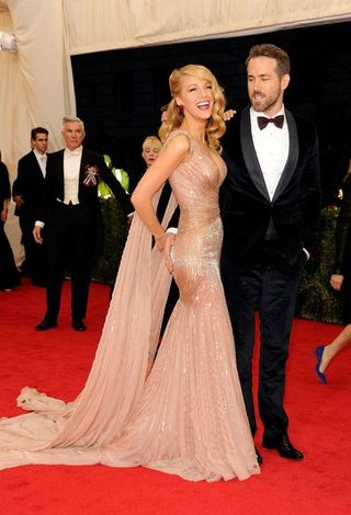 Red carpet, Gown, Carpet, Dress, Flooring, Clothing, Formal wear, Fashion, Suit, Event,