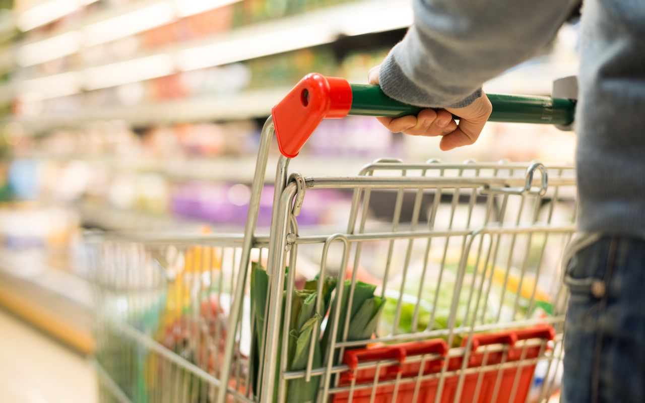 Close-up detail of a man shopping in a supermarket