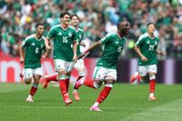 MEXICO CITY, MEXICO - JUNE 11: Julian Quinones #16 of Mexico celebrates with teammates after scoring the team's first goal during the FIFA World Cup 2026 Group A match between Mexico and South Africa at Mexico City Stadium on June 11, 2026 in Mexico City, Mexico. (Photo by Carl Recine/Getty Images)