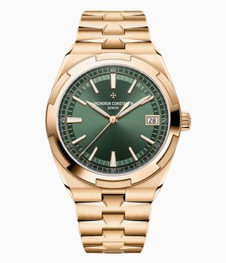 gold watch with green face