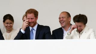 britain's prince harry l, mike tindall c and britain's princess anne, princess royal r laugh as they attend the patron's lunch, a special street party outside buckingham palace in london on june 12, 2016, as part of the three day celebrations for queen elizabeth ii's official 90th birthdayup to 10,000 people are expected to attend the patron's lunch along with the monarch, her husband prince philip, prince william and prince harry afp justin tallis photo credit should read justin tallisafp via getty images