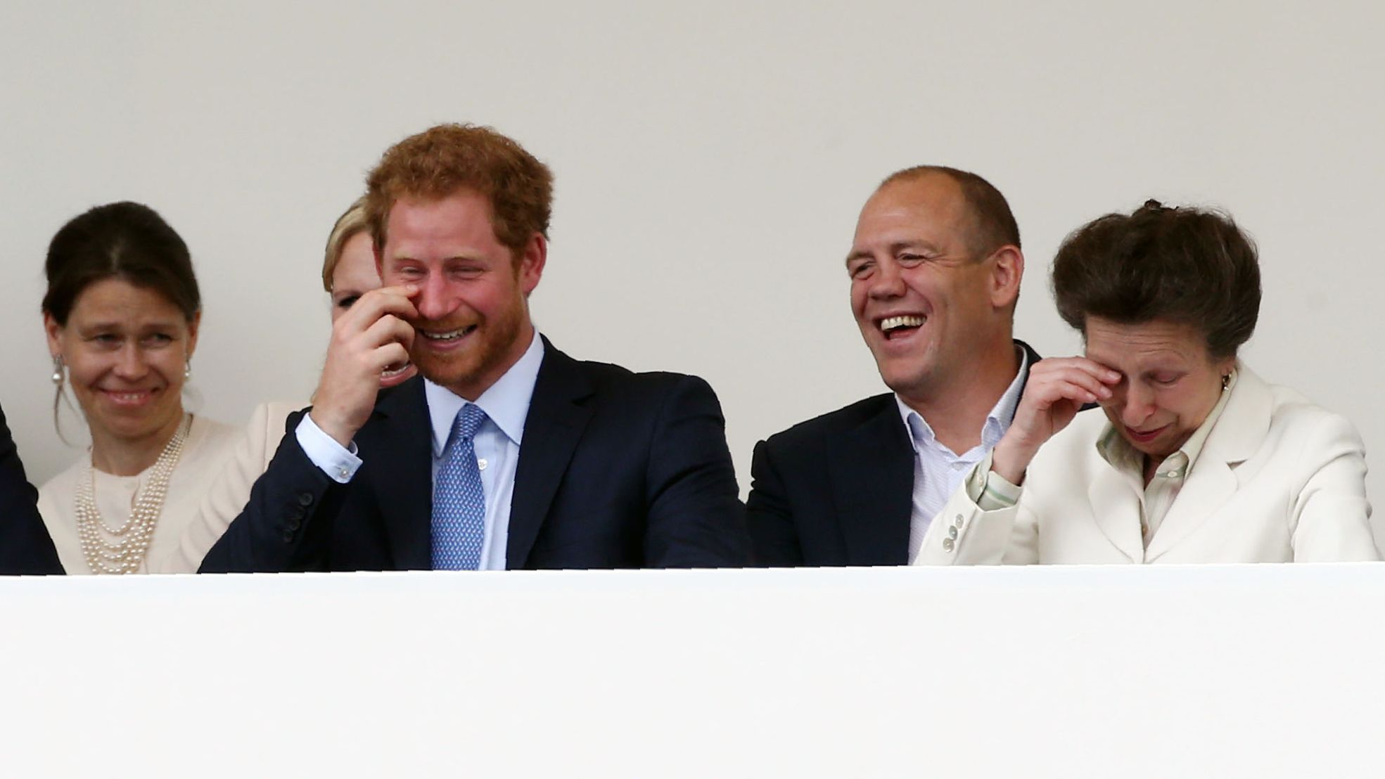 britain's prince harry l, mike tindall c and britain's princess anne, princess royal r laugh as they attend the patron's lunch, a special street party outside buckingham palace in london on june 12, 2016, as part of the three day celebrations for queen elizabeth ii's official 90th birthdayup to 10,000 people are expected to attend the patron's lunch along with the monarch, her husband prince philip, prince william and prince harry afp justin tallis photo credit should read justin tallisafp via getty images