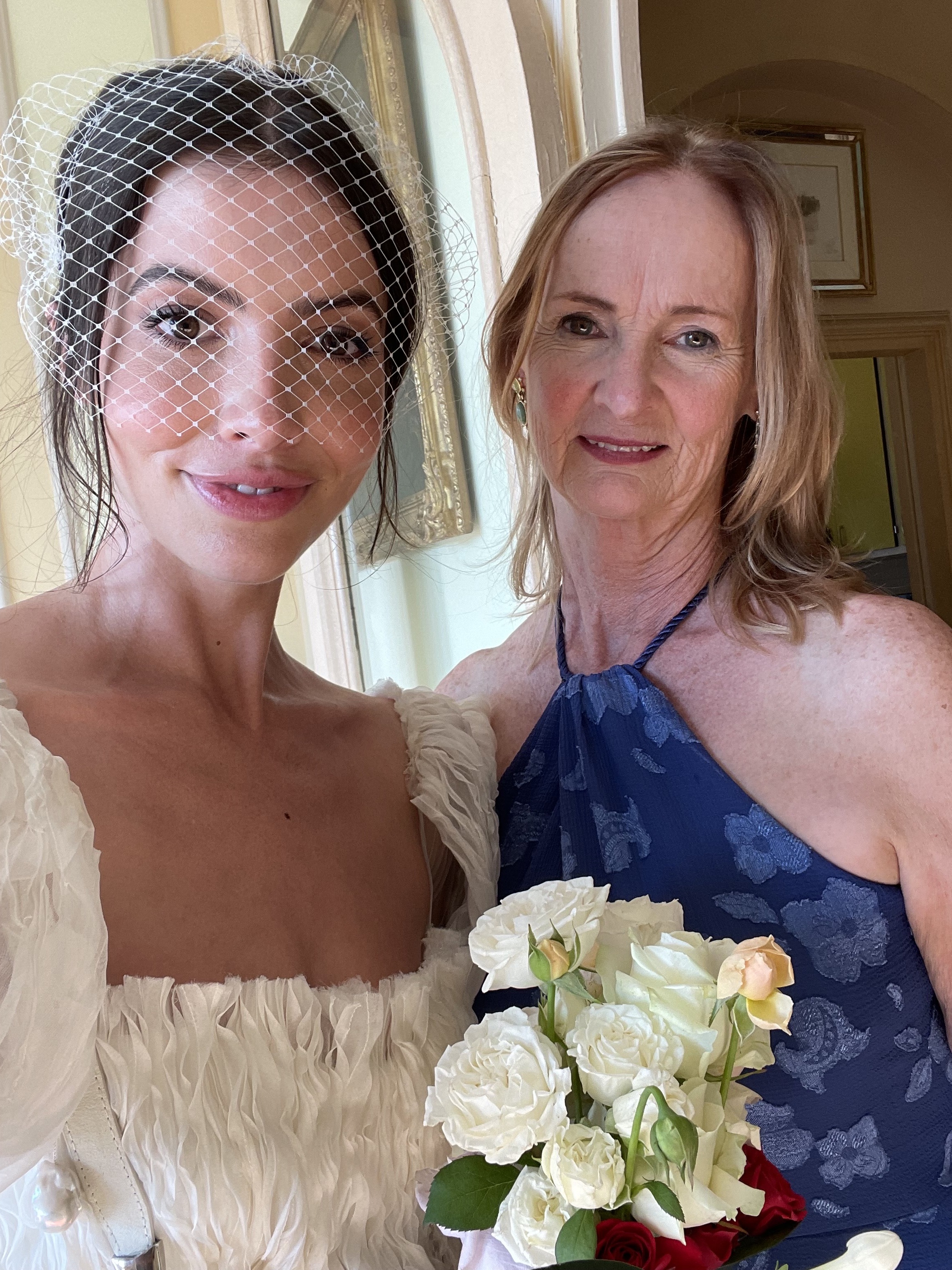 Kat Collings on her wedding day with her mother