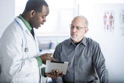 A man talking to his doctor