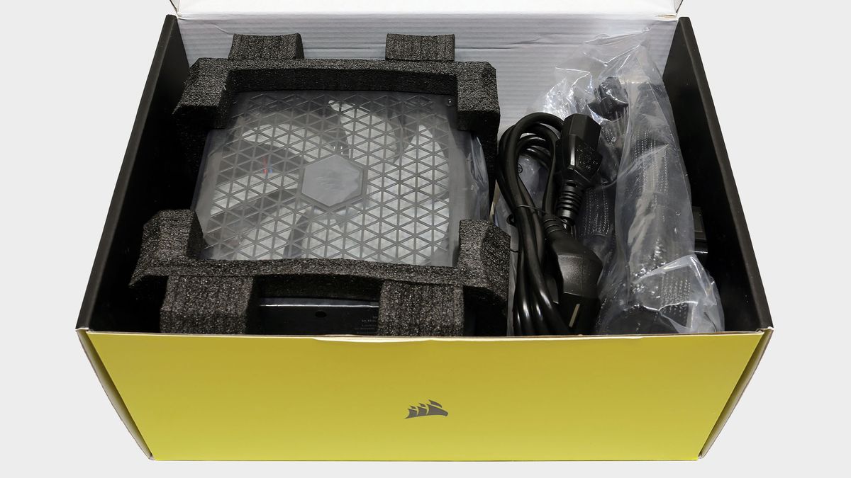 Corsair RM750x power supply pictured with and without box.
