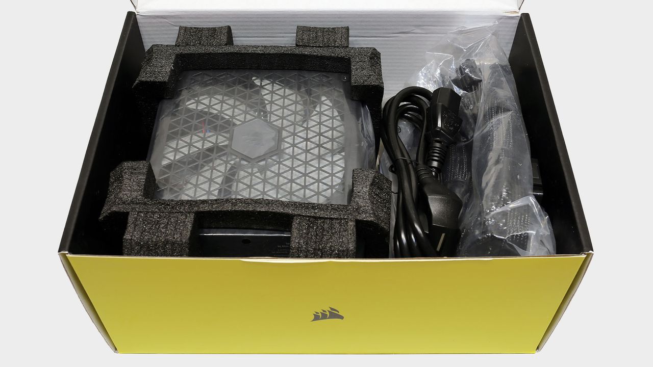 Corsair RM750x power supply pictured with and without box.