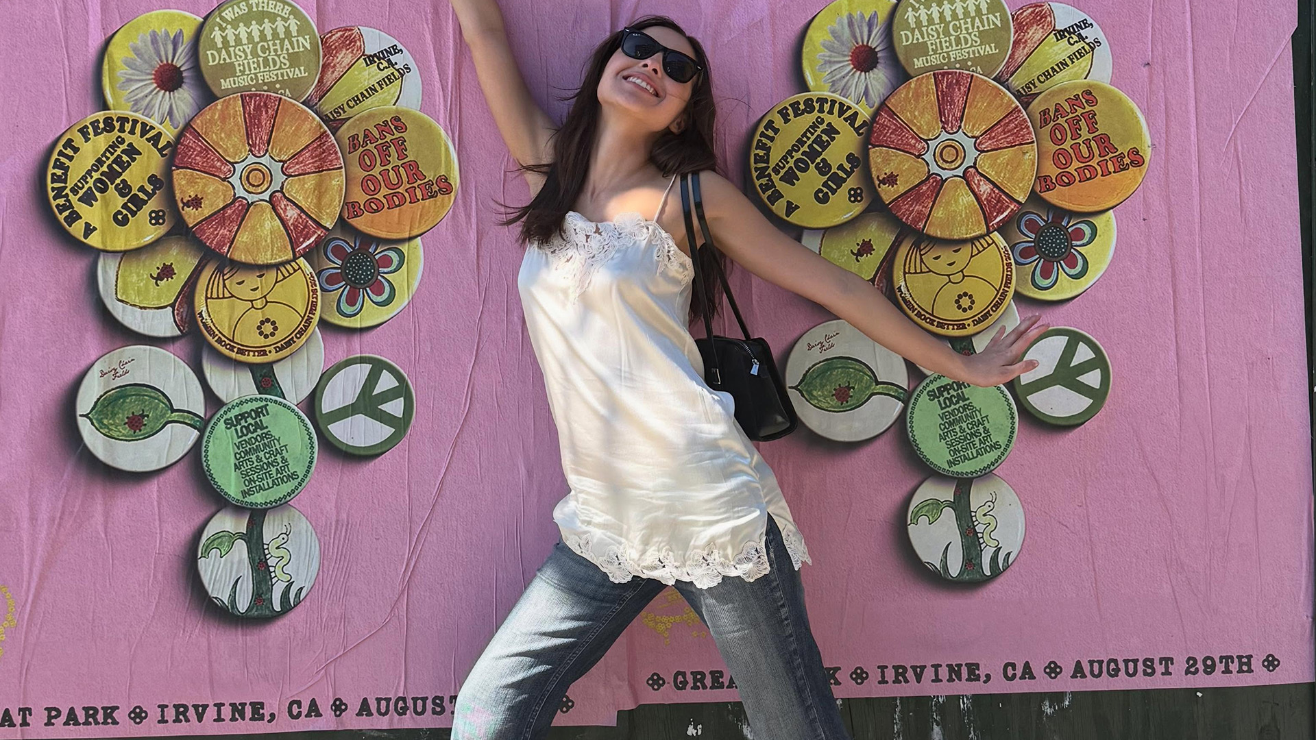 Olivia Rodrigo bootcut jeans and lacey dress