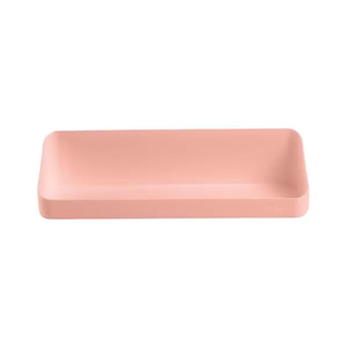 A blush pink plain magnetic shelf