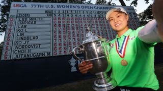 Minjee Lee in front of the US Open leaderboard after winning