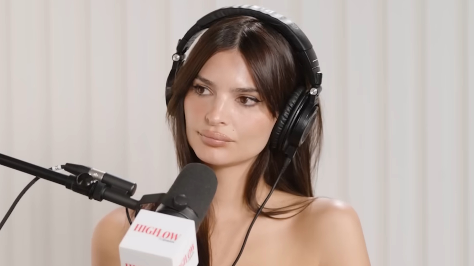 Emily Ratajkowski is shown on her High Low podcast.