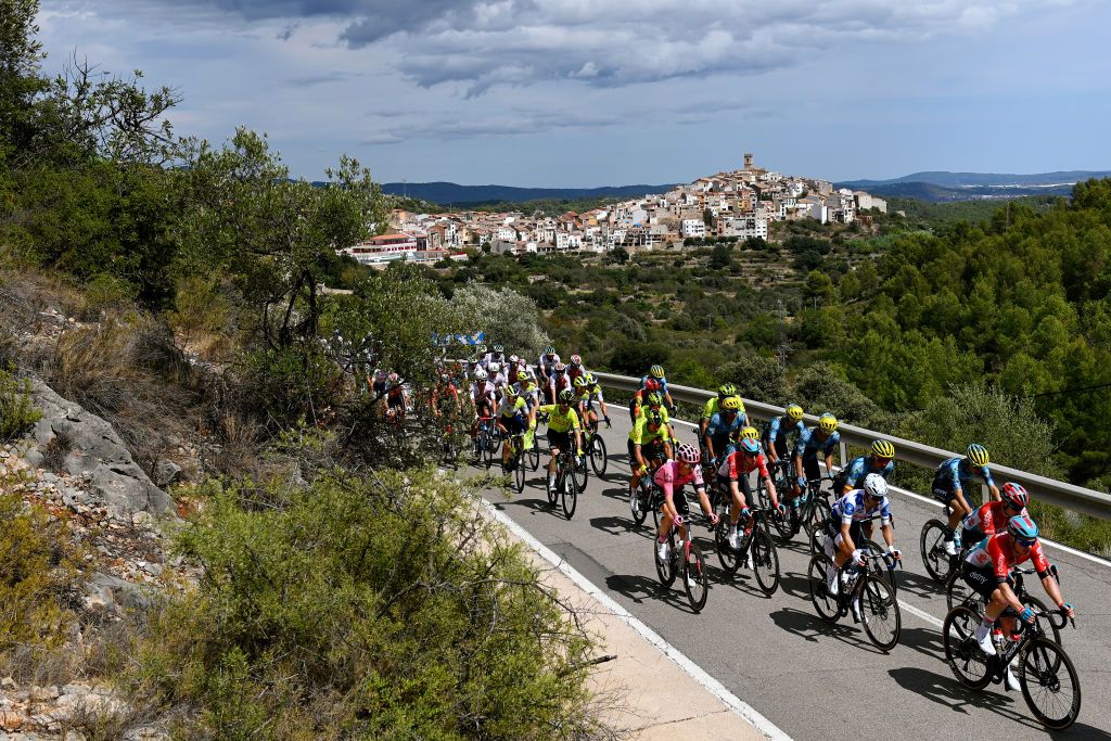 BURRIANA SPAIN AUGUST 30 Julius Van Den Berg of The Netherlands and Team EF EducationEasyPost Milan Menten of Belgium and Team Lotto Dstny Javier Romo Oliver of Spain and Astana Qazaqstan Team Eduardo Seplveda of Argentina and Team Lotto Dstny Polka dot Mountain Jersey and a general view of the peloton compete passing through a Les Useres village during the 78th Tour of Spain 2023 Stage 5 a 1846km stage from Burriana to Burriana UCIWT on August 30 2023 in Morella Spain Photo by Tim de WaeleGetty Images