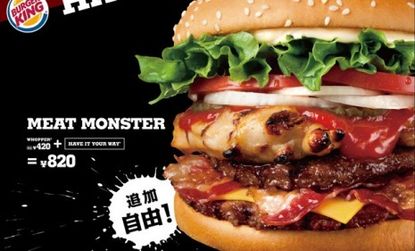 Burger King Japan tops the caloric charts with the "Meat Monster": Two hamburgers, a chicken breast, two slices of cheese, and three slices of bacon all for 1150 calories. 
