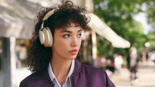 Bowers & Wilkins Px8 on tan worn by young female model