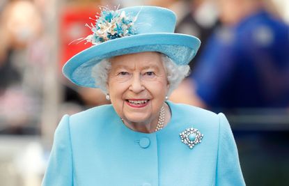 Queen Elizabeth II visits the British Airways headquarters to mark their centenary year at Heathrow Airport