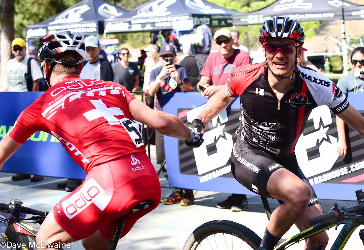 Raphael Gagne (Rocky Mountain) congratulates Nino Schurter (Scott) on his victory
