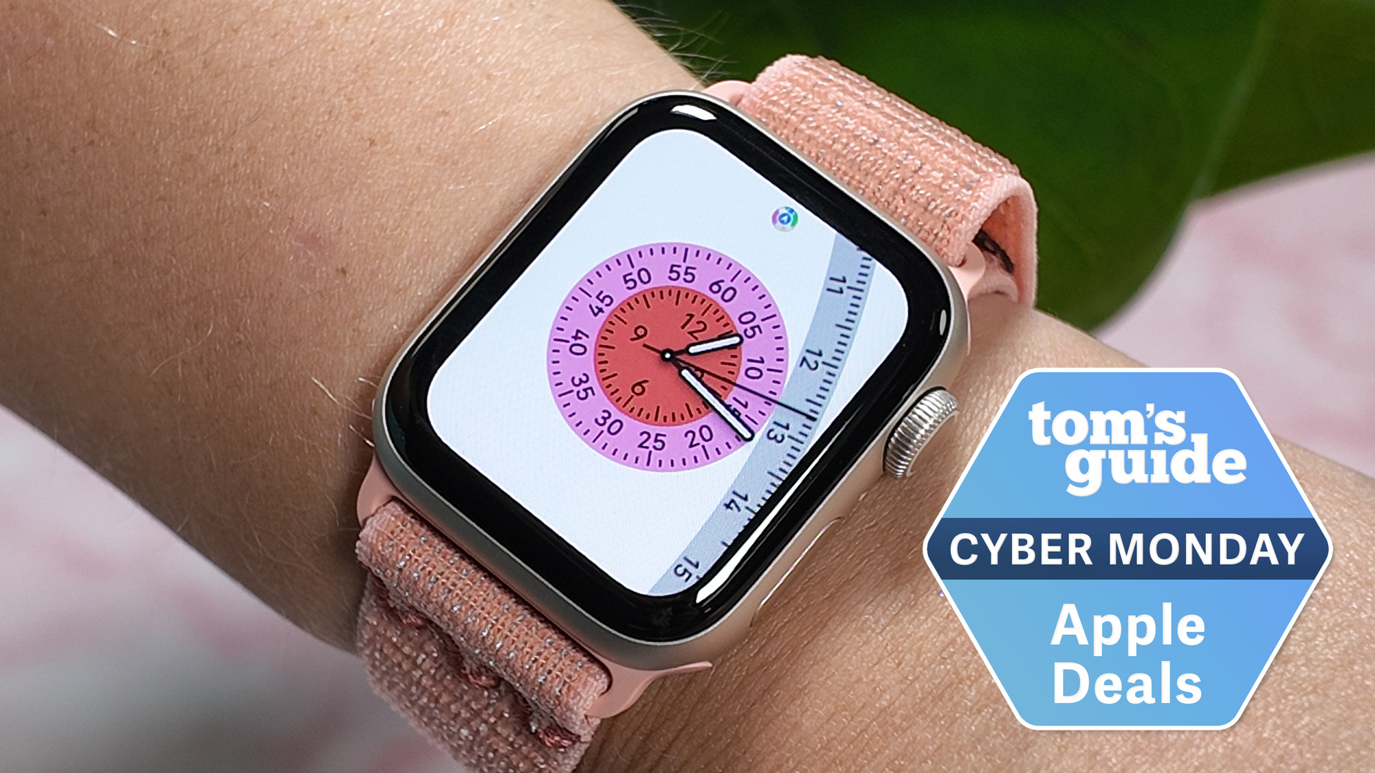 Apple Watch SE 3 with Tom's Guide Cyber Monday Apple Deals badge