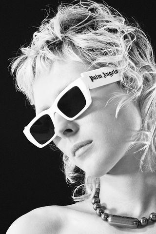 Palm Angels white sunglasses worn by female model