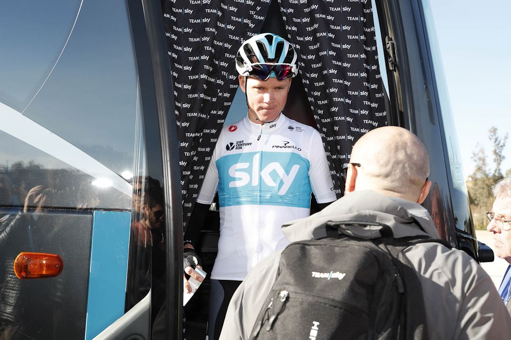 Chris Froome emerges from the Team Sky bus ahead of stage 1 at Ruta del Sol