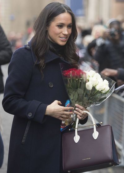 Street fashion, Fashion, Event, Flower, Smile, Plant, Floristry, Fashion accessory, Businessperson, Bouquet,