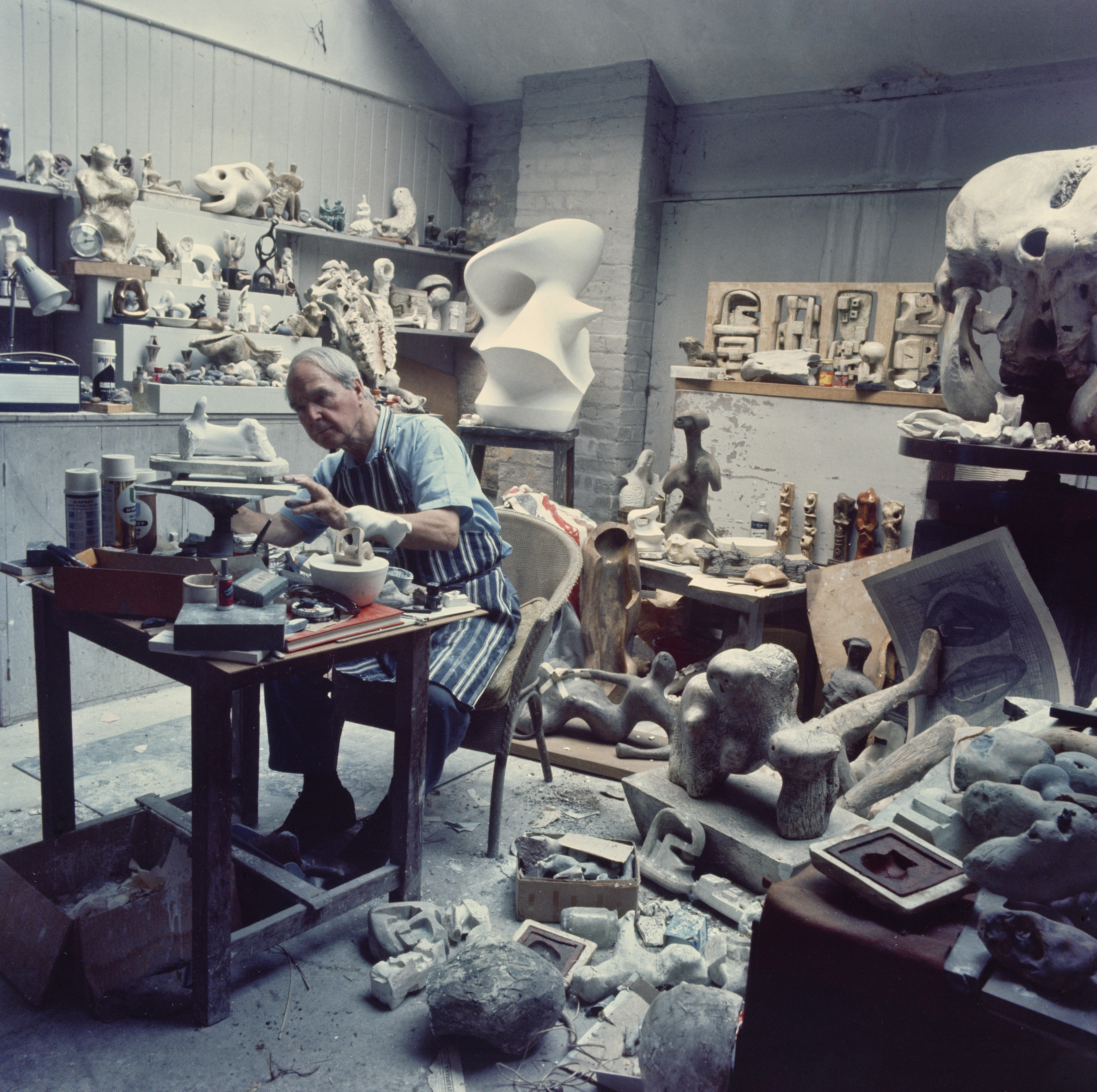 Henry Moore in his Maquette Studio 1968 surrounded by works in progress