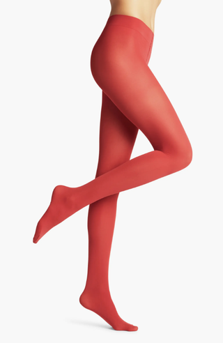 a model wearing red tights