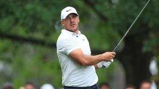 Brooks Koepka hits an iron shot during round 2 of the 87th Masters