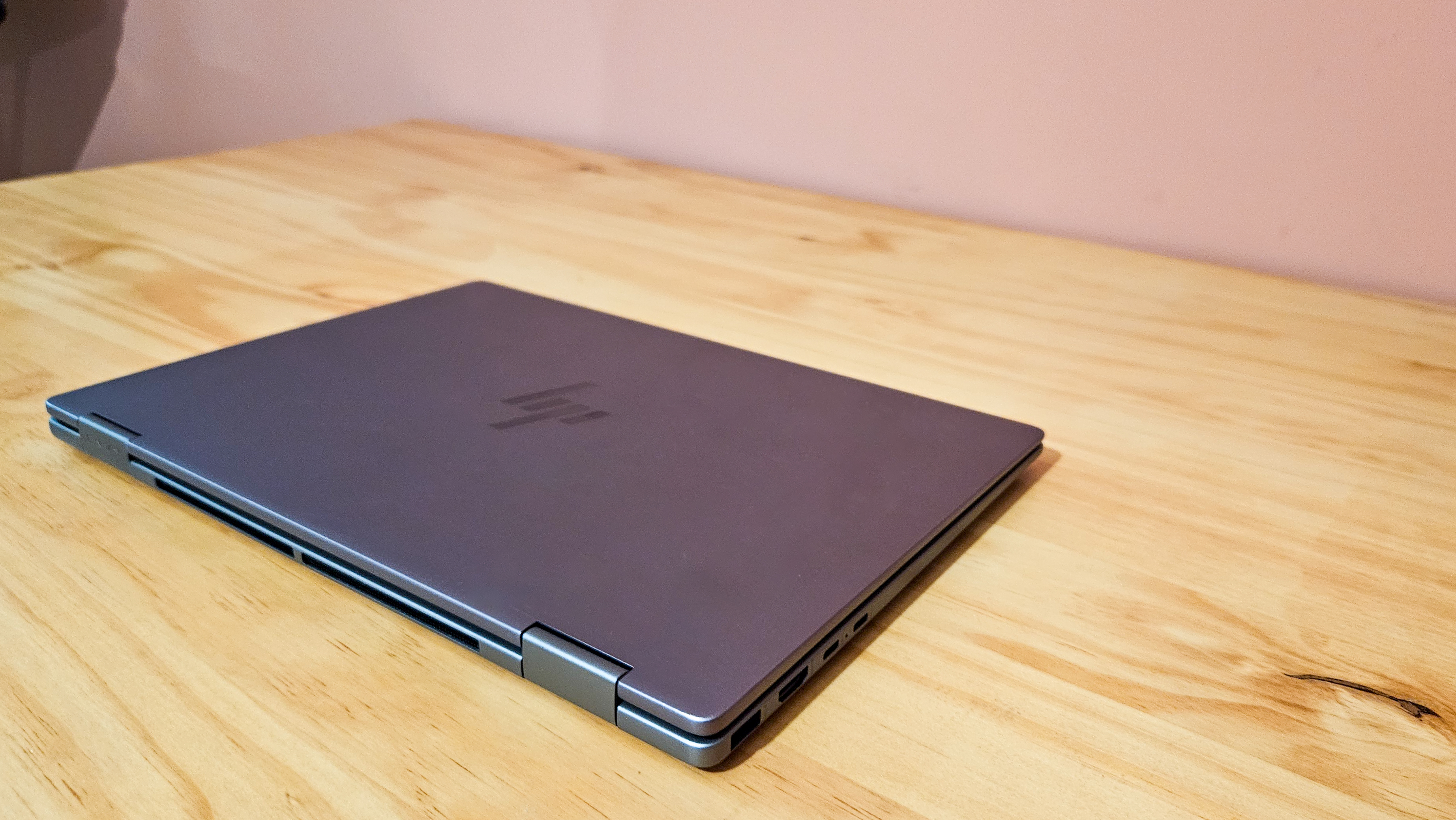 HP Envy x360 14 laptop on table (closed).