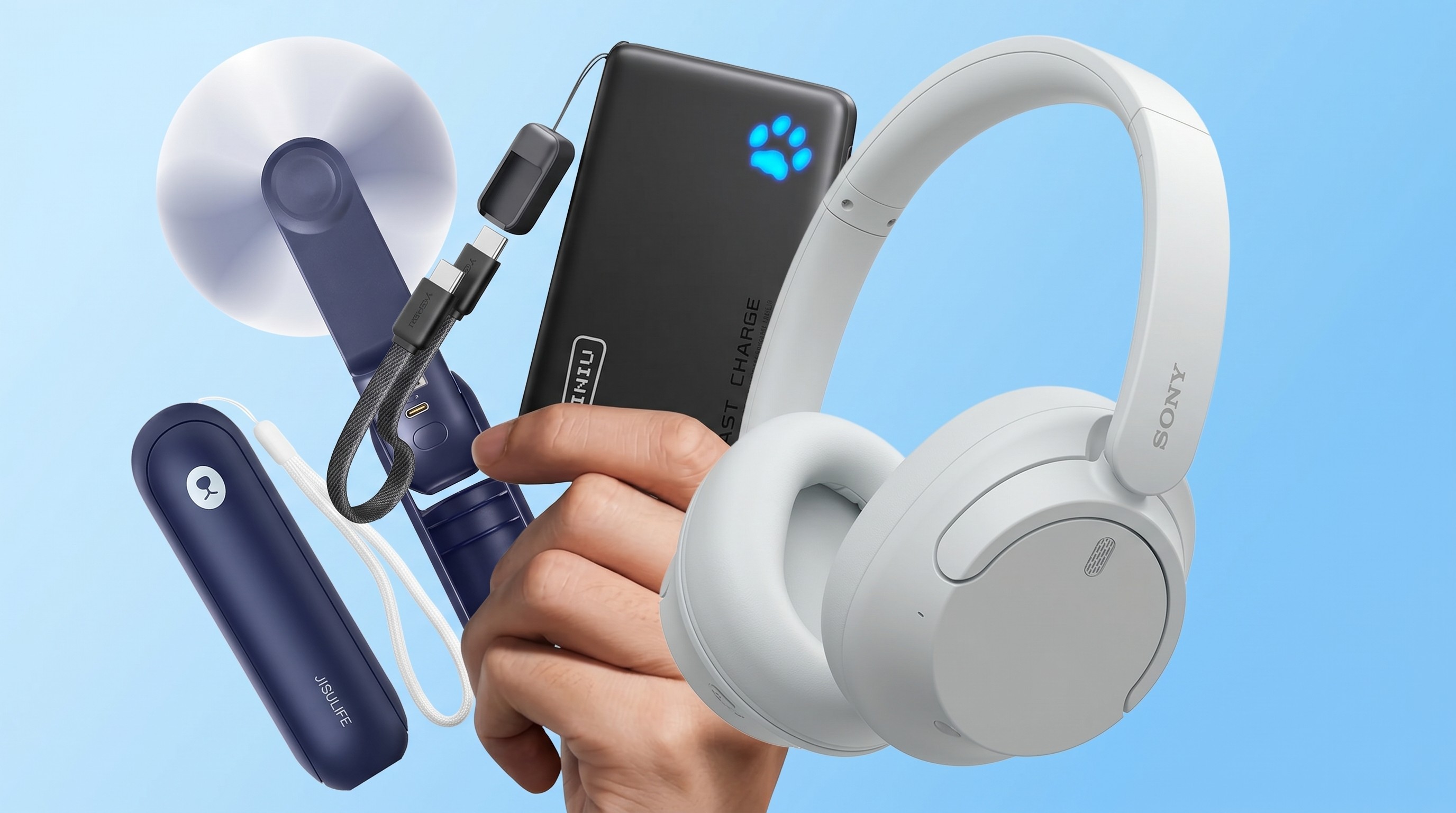 A travel charger, headphones and travel fan.