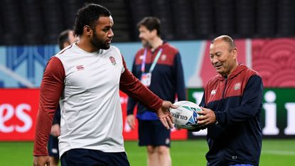 England head coach Eddie Jones receives the ball from flanker Billy Vunipola during the Captain’s Run in Sapporo