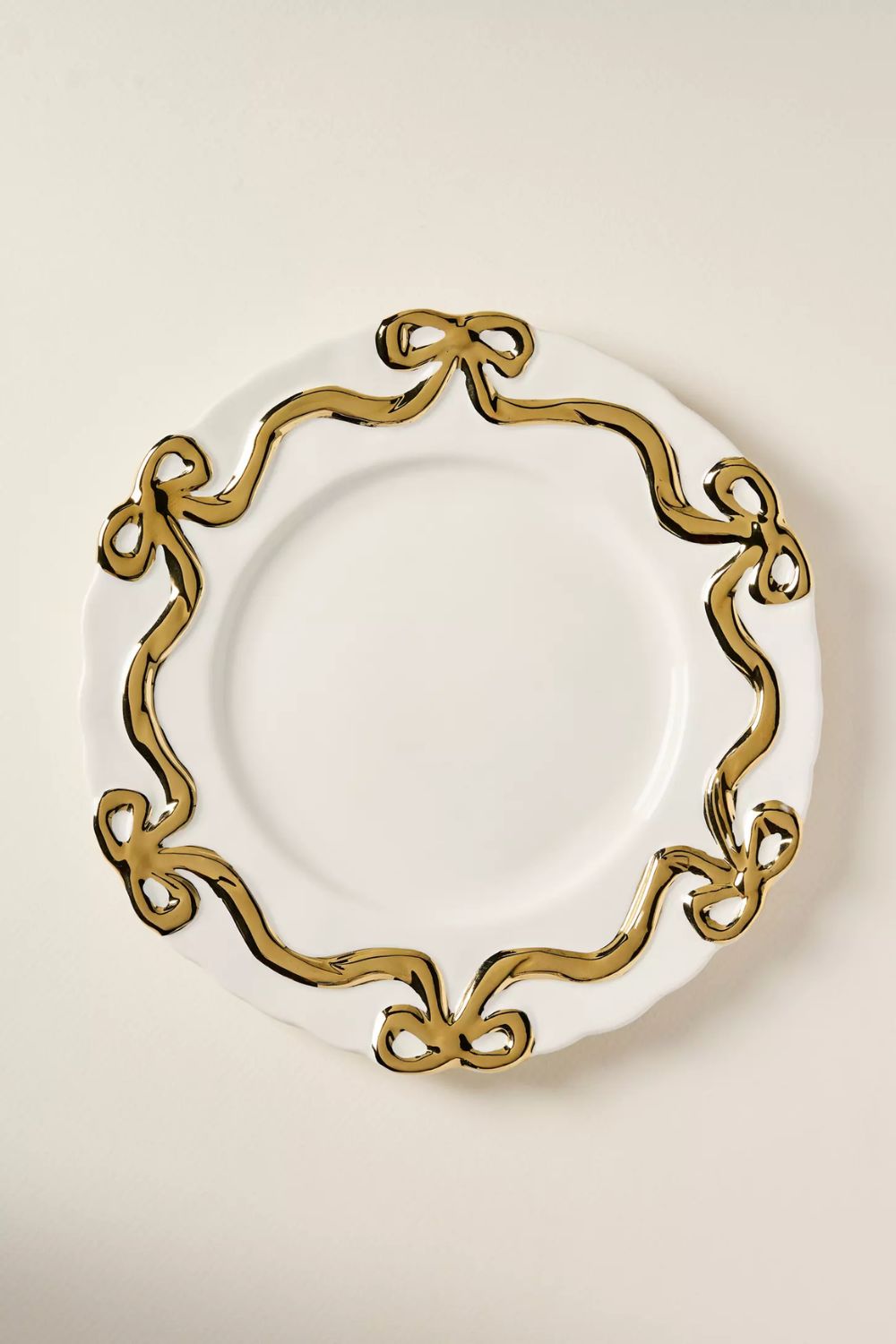 White side plate with gold bow detailing