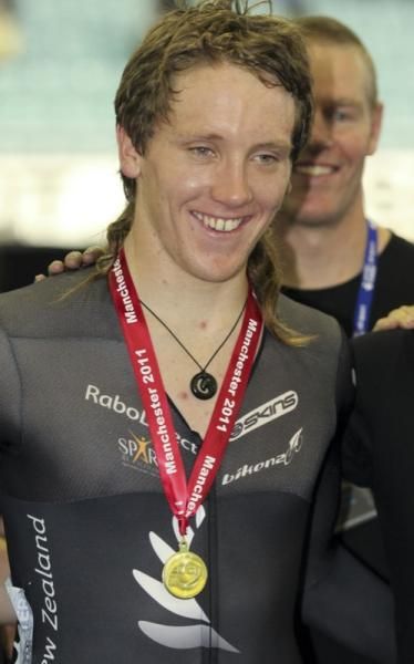 A delighted Shane Archbold (NZL) with the gold medal he won in the men's omnium.