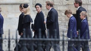 Laura Lopes and Tom Parker Bowles arrive with their families at Westminster Abbey ahead of The State funeral of Queen Elizabeth II