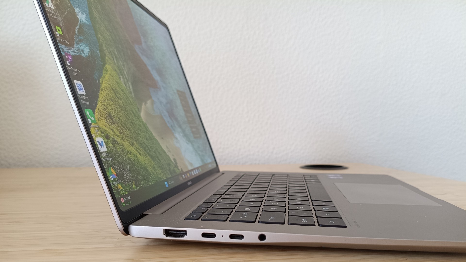 Close up on left hand ports on Honor MagicBook Pro 14 laptop on desk