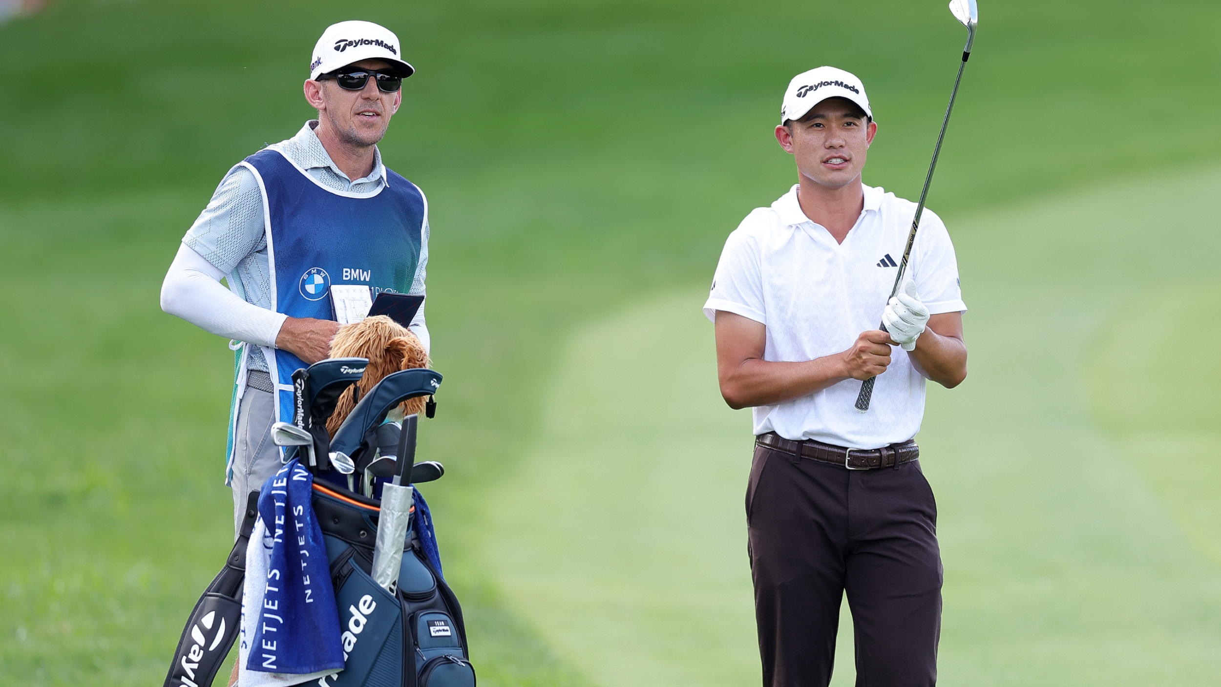 Collin Morikawa with caddie Mark Urbanek  