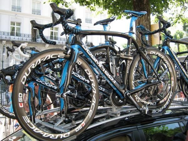 The black and blue Pinarello bikes on the Team Sky car