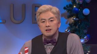 Bowen Yang wears a bowtie in his last SNL sketch.