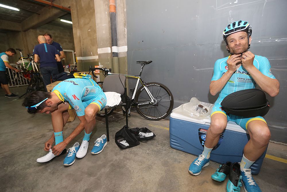 The Astana team prepare for training