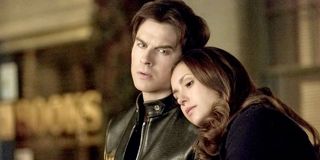The Vampire Diaries Elena leans on Damon shoulder The CW